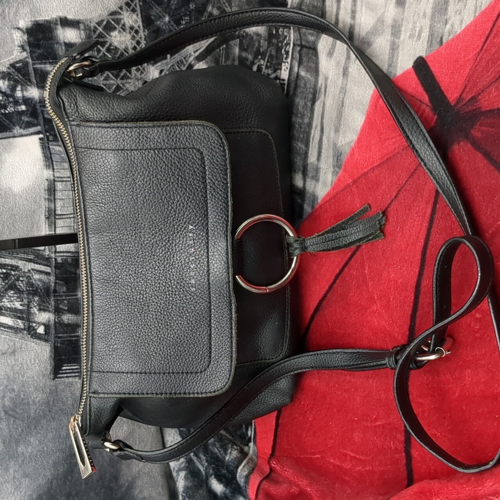Sanctuary and black leather bag